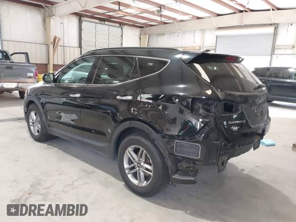 2018 Hyundai Santa Fe 2.4L with VIN 5NMZU3LB1JH054077, listed as a IAAI auction lot 43286208 with 81,100 mi miles and . Bid and sale history available at DreamBid. Image 3.
