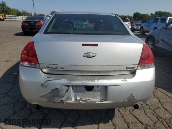 2013 Chevrolet Impala LT z VIN 2G1WG5E3XD1258762, wystawiony jako Copart lot #71869195 z przebiegiem 215 055 mil mil oraz Szkoda całkowita • Salvage title. Historia ofert i sprzedaży dostępna na DreamBid. Obrazek 6.
