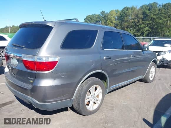 2011 Dodge Durango Crew with VIN 1D4RD4GG3BC725019, listed as a IAAI auction lot 43422140 with 186,047 mi miles and . Bid and sale history available at DreamBid. Image 4.