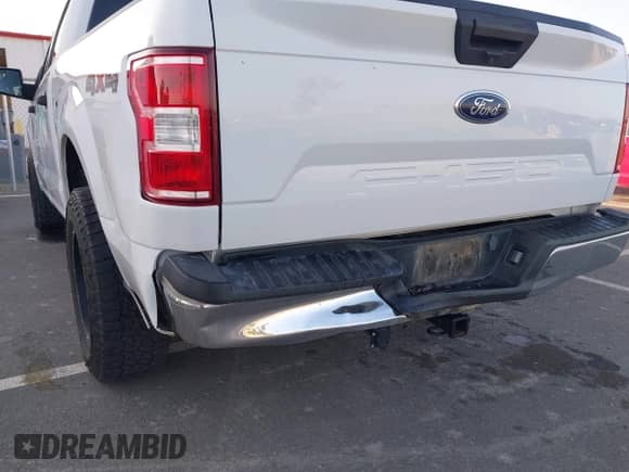 2018 Ford F-150 XL z VIN 1FTEW1E55JFC47477, wystawiony jako IAAI lot #43512100 z przebiegiem 124 341 mil mil oraz . Historia ofert i sprzedaży dostępna na DreamBid. Obrazek 6.