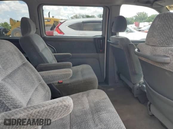 2000 Honda Odyssey LX с VIN 2HKRL1856YH618071, выставлен на аукционе Copart как лот 63548615 с пробегом 206 949 миль миль и Списание • Salvage title. История ставок и продаж доступна на DreamBid. Изображение 11.