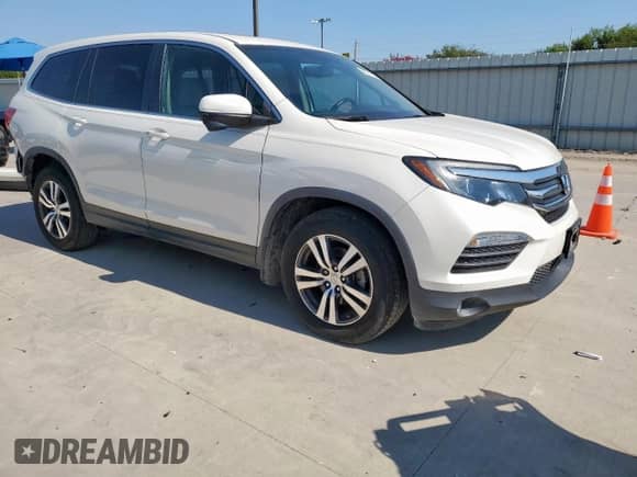 2018 Honda Pilot EX-L with VIN 5FNYF5H52JB012118, listed as a Copart auction lot 80391505 with 106,005 mi miles and Salvage title. Bid and sale history available at DreamBid. Image 4.