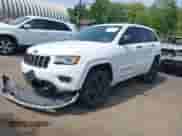 2016 Jeep Grand Cherokee High Altitude with VIN 1C4RJFCG3GC461914, listed as a IAAI auction lot 42432035 with 166,650 mi miles and . Bid and sale history available at DreamBid. Image 2.