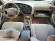 1995 Toyota Camry LE z VIN 4T1SK12E6SU898113, wystawiony jako Copart lot #82712455 z przebiegiem 170 935 mil mil oraz Szkoda całkowita • Salvage title. Historia ofert i sprzedaży dostępna na DreamBid. Obrazek 8.