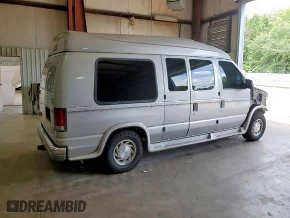 2001 Ford Econoline Cargo Recreational with VIN 1FDRE14L51HA62950, listed as a Copart auction lot 60860705 with 199,611 mi miles and Salvage title. Bid and sale history available at DreamBid. Image 3.