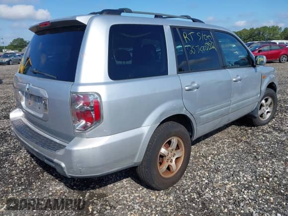 2006 Honda Pilot EX-L z VIN 5FNYF28536B000517, wystawiony jako IAAI lot #43160568 z przebiegiem Nie podano mil oraz . Historia ofert i sprzedaży dostępna na DreamBid. Obrazek 4.