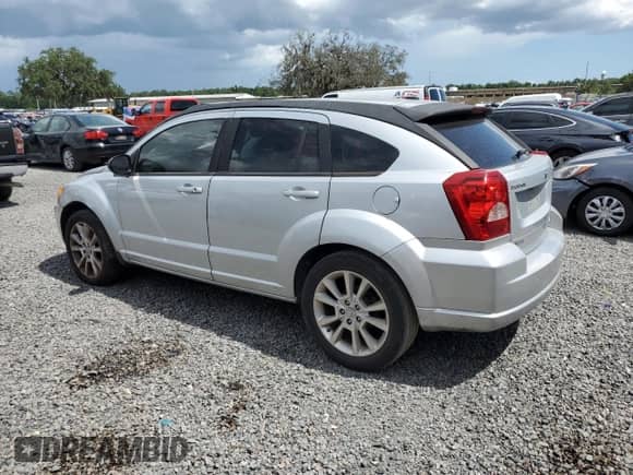 2011 Dodge Caliber Heat with VIN 1B3CB5HA4BD113240, listed as a Copart auction lot 59686995 with 222,474 mi miles and Salvage title. Bid and sale history available at DreamBid. Image 2.