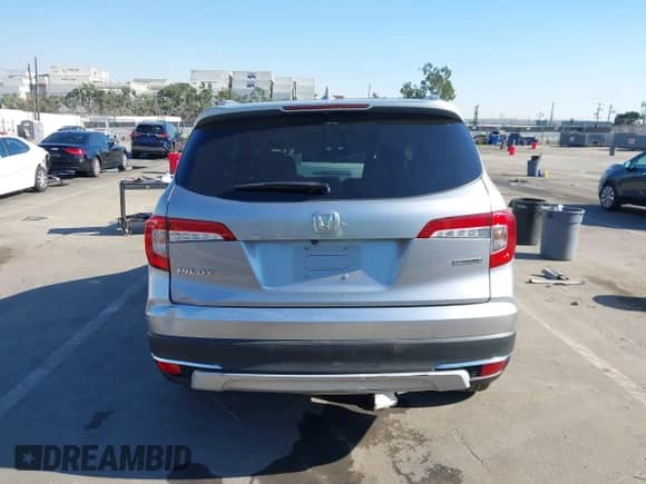 2020 Honda Pilot Touring 7-Passenger z VIN 5FNYF5H65LB006048, wystawiony jako IAAI lot #41294635 z przebiegiem 32 429 mil mil oraz . Historia ofert i sprzedaży dostępna na DreamBid. Obrazek 17.