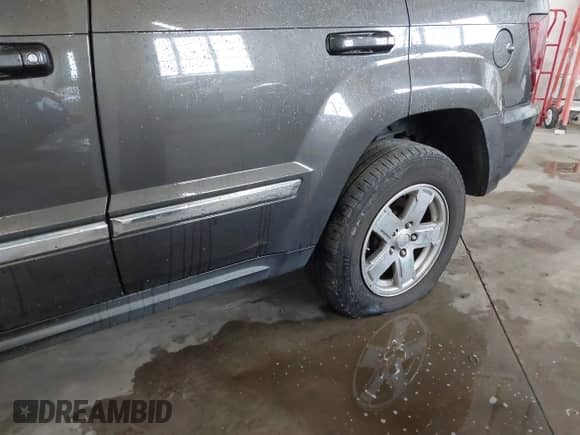 2006 Jeep Grand Cherokee Limited with VIN 1J4HR58N16C310410, listed as a IAAI auction lot 43194311 with 183,594 mi miles and . Bid and sale history available at DreamBid. Image 6.