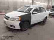2011 Chevrolet Aveo 1LT with VIN KL1TD5DE4BB196155, listed as a IAAI auction lot 43471758 with 197,216 mi miles and . Bid and sale history available at DreamBid. Image 2.