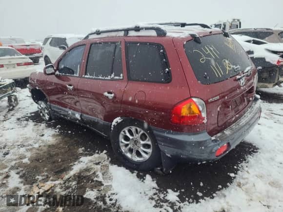 2002 Hyundai Santa Fe GLS z VIN KM8SC73D82U229282, wystawiony jako Copart lot #82037604 z przebiegiem Nie podano mil oraz Szkoda całkowita • Salvage title. Historia ofert i sprzedaży dostępna na DreamBid. Obrazek 2.