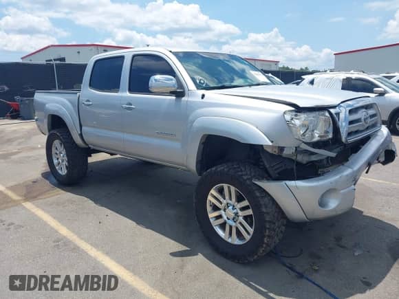 2010 Toyota Tacoma PreRunner z VIN 3TMJU4GN5AM093419, wystawiony jako IAAI lot #42882575 z przebiegiem 227 641 mil mil oraz . Historia ofert i sprzedaży dostępna na DreamBid. Obrazek 1.