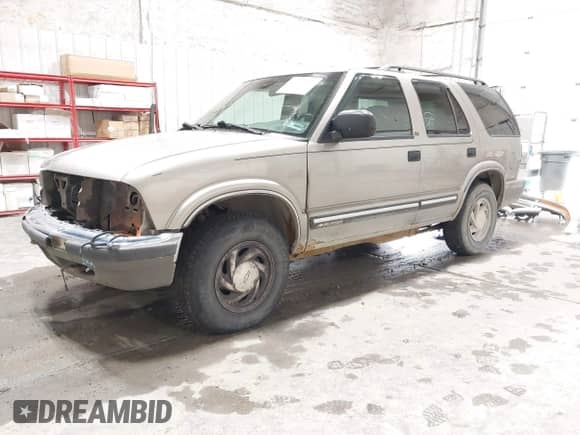 2001 Chevrolet Blazer LT z VIN 1GNDT13W012149519, wystawiony jako IAAI lot #42935277 z przebiegiem 190 141 mil mil oraz . Historia ofert i sprzedaży dostępna na DreamBid. Obrazek 2.