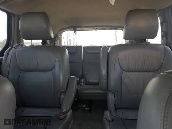 2010 Toyota Sienna XLE z VIN 5TDDK4CC8AS032007, wystawiony jako Copart lot #65611495 z przebiegiem 299 904 mil mil oraz Szkoda całkowita • Salvage title. Historia ofert i sprzedaży dostępna na DreamBid. Obrazek 10.