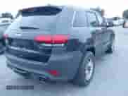 2014 Jeep Grand Cherokee SRT-8 z VIN 1C4RJFDJ9EC347505, wystawiony jako IAAI lot #41896248 z przebiegiem 59 049 mil mil oraz . Historia ofert i sprzedaży dostępna na DreamBid. Obrazek 4.