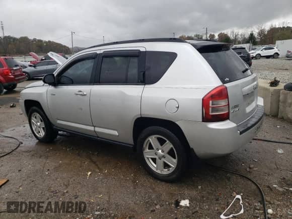 2010 Jeep Compass Latitude с VIN 1J4NF1FB1AD646011, выставлен на аукционе Copart как лот 79056184 с пробегом 178 737 миль миль и На запчасти • Non repairable. История ставок и продаж доступна на DreamBid. Изображение 2.