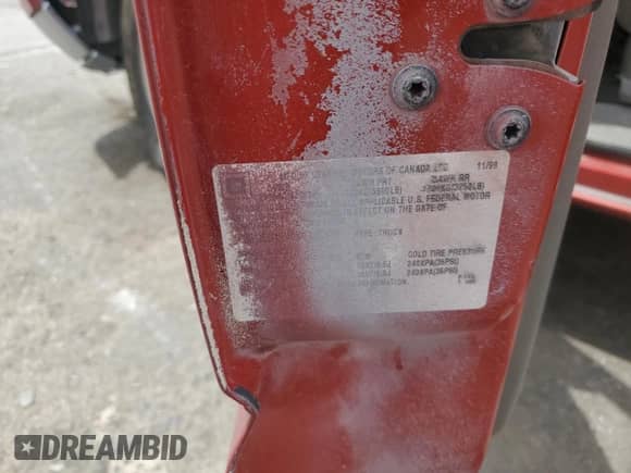 2000 Chevrolet Silverado 1500 LS with VIN 2GCEC19V0Y1220370, listed as a Copart auction lot 53490065 with 187,475 mi miles and Salvage title. Bid and sale history available at DreamBid. Image 12.