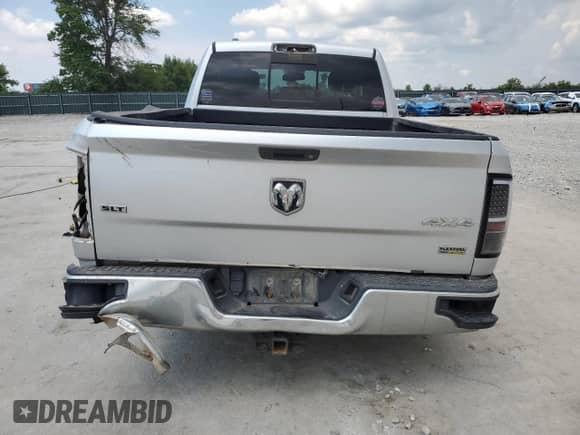 2015 Ram 1500 SLT z VIN 1C6RR7GG9FS571810, wystawiony jako Copart lot #68077875 z przebiegiem 125 159 mil mil oraz Szkoda całkowita • Salvage title. Historia ofert i sprzedaży dostępna na DreamBid. Obrazek 6.
