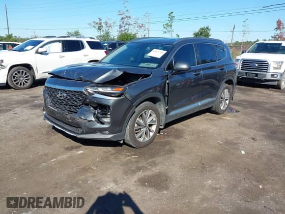 2019 Hyundai Santa Fe SEL with VIN 5NMS33AD6KH127602, listed as a IAAI auction lot 43471728 with 66,898 mi miles and . Bid and sale history available at DreamBid. Image 2.