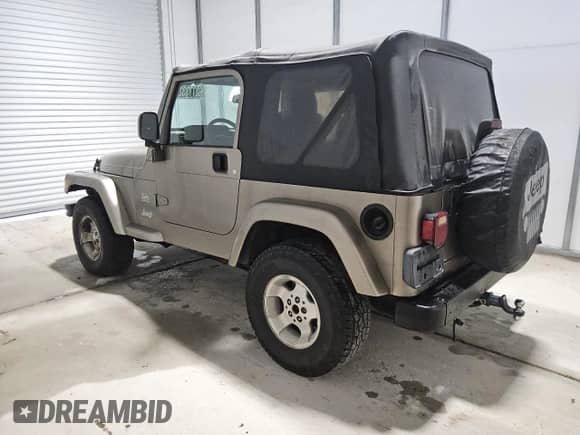 2003 Jeep Wrangler Sahara с VIN 1J4FA59S33P363830, выставлен на аукционе Copart как лот 62773325 с пробегом 114 286 миль миль и Чистый • Clean title. История ставок и продаж доступна на DreamBid. Изображение 2.