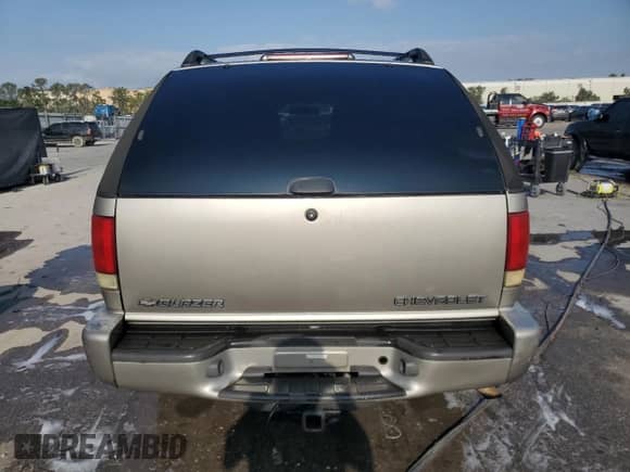 2002 Chevrolet Blazer LS с VIN 1GNCS18W52K214535, выставлен на аукционе Copart как лот 55815465 с пробегом 160 614 миль миль и Списание • Salvage title. История ставок и продаж доступна на DreamBid. Изображение 6.
