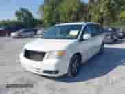 2009 Dodge Grand Caravan SXT with VIN 2D8HN54139R583365, listed as a IAAI auction lot 43247842 with 174,640 mi miles and . Bid and sale history available at DreamBid. Image 2.