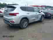2019 Hyundai Santa Fe SE z VIN 5NMS23AD0KH011086, wystawiony jako IAAI lot #43300514 z przebiegiem 109 476 mil mil oraz . Historia ofert i sprzedaży dostępna na DreamBid. Obrazek 4.