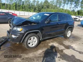 2017 Jeep Grand Cherokee Altitude with VIN 1C4RJEAG4HC877825, listed as a Copart auction lot 60314885 with 164,611 mi miles and Salvage title. Bid and sale history available at DreamBid. Image 1.