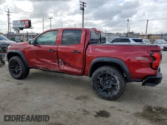 2023 Chevrolet Colorado 4WD Trail Boss с VIN 1GCPTEEK7P1185939, выставлен на аукционе Copart как лот 54711295 с пробегом 3 476 миль миль и Списание • Salvage title. История ставок и продаж доступна на DreamBid. Изображение 2.