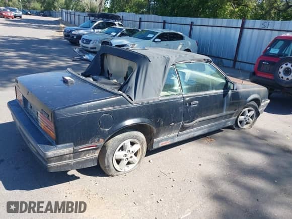 1986 Chevrolet Cavalier with VIN 1G1JE67W1G7187925, listed as a IAAI auction lot 42623392 with Not provided miles and . Bid and sale history available at DreamBid. Image 4.