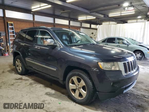 2012 Jeep Grand Cherokee Limited z VIN 1C4RJFBT4CC264632, wystawiony jako Copart lot #90137105 z przebiegiem 214 018 mil mil oraz Czysty tytuł • Clean title. Historia ofert i sprzedaży dostępna na DreamBid. Obrazek 4.