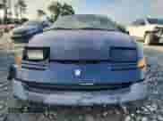 1994 Saturn SC with VIN 1G8ZG1575RZ133631, listed as a Copart auction lot 85352545 with 84,474 mi miles and Salvage title. Bid and sale history available at DreamBid. Image 5.