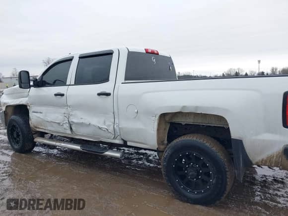 2017 Chevrolet Silverado 2500HD Work Truck z VIN 1GC1KUEG5HF222795, wystawiony jako IAAI lot #41717477 z przebiegiem 223 784 mil mil oraz . Historia ofert i sprzedaży dostępna na DreamBid. Obrazek 12.