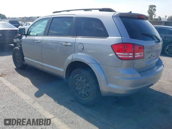 2017 Dodge Journey SE with VIN 3C4PDCAB0HT683398, listed as a IAAI auction lot 43052069 with 139,025 mi miles and . Bid and sale history available at DreamBid. Image 3.