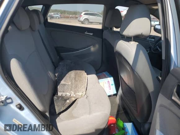 2013 Hyundai Accent GS z VIN KMHCT5AEXDU094460, wystawiony jako Copart lot #82002485 z przebiegiem Nie podano mil oraz Szkoda całkowita • Salvage title. Historia ofert i sprzedaży dostępna na DreamBid. Obrazek 10.