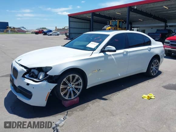 2013 BMW 7 Series 750Li xDrive with VIN WBAYF8C59DD141510, listed as a IAAI auction lot 42497077 with 137,254 mi miles and . Bid and sale history available at DreamBid. Image 17.