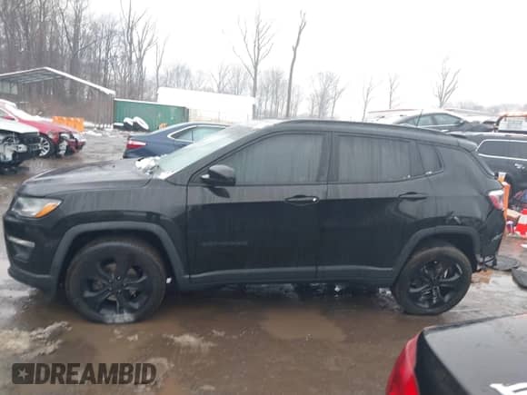 2020 Jeep Compass Latitude with VIN 3C4NJCBB5LT166329, listed as a IAAI auction lot 41554098 with 59,853 mi miles and . Bid and sale history available at DreamBid. Image 14.