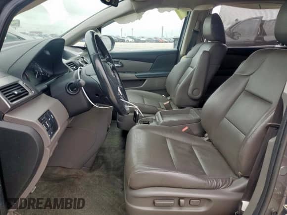 2015 Honda Odyssey Touring Elite с VIN 5FNRL5H96FB082857, выставлен на аукционе Copart как лот 59637105 с пробегом 187 947 миль миль и Списание • Salvage title. История ставок и продаж доступна на DreamBid. Изображение 7.