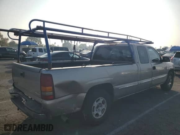 2002 GMC Sierra 1500 SLE с VIN 1GTEC19T32E124432, выставлен на аукционе Copart как лот 83583374 с пробегом Не указан миль и Списание • Salvage title. История ставок и продаж доступна на DreamBid. Изображение 3.