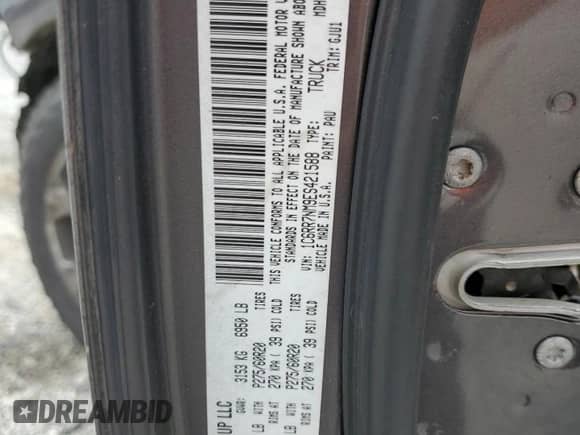 2014 Ram 1500 Laramie z VIN 1C6RR7NM9ES421588, wystawiony jako Copart lot #81893985 z przebiegiem 231 749 mil mil oraz Szkoda całkowita • Salvage title. Historia ofert i sprzedaży dostępna na DreamBid. Obrazek 13.