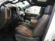 2021 Chevrolet Silverado 1500 High Country with VIN 1GCUYHEL7MZ255063, listed as a Copart auction lot 64203335 with 103,889 mi miles and Salvage title. Bid and sale history available at DreamBid. Image 7.