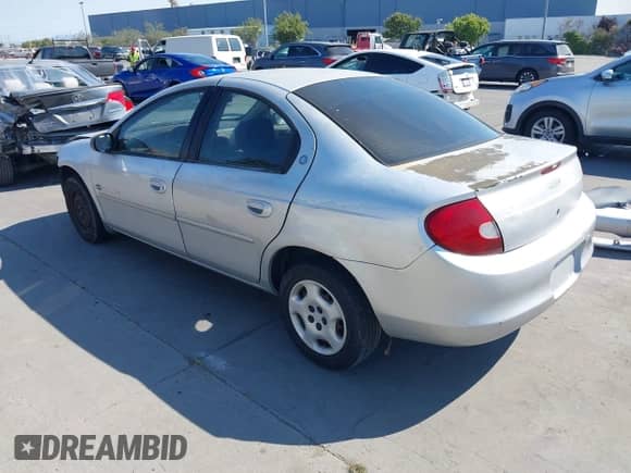 2000 Dodge Neon Highline z VIN 1B3ES46C0YD644127, wystawiony jako IAAI lot #42720745 z przebiegiem 221 914 mil mil oraz . Historia ofert i sprzedaży dostępna na DreamBid. Obrazek 3.