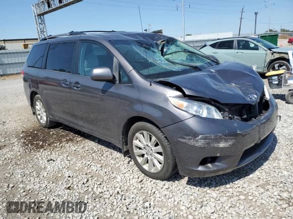 2012 Toyota Sienna LE with VIN 5TDJK3DCXCS037322, listed as a Copart auction lot 80159085 with 192,308 mi miles and Salvage title. Bid and sale history available at DreamBid. Image 4.