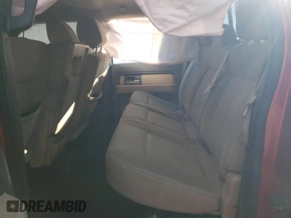 2013 Ford F-150 XL z VIN 1FTFW1ET6DFD67120, wystawiony jako Copart lot #69647805 z przebiegiem Nie podano mil oraz Szkoda całkowita • Salvage title. Historia ofert i sprzedaży dostępna na DreamBid. Obrazek 10.