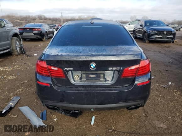 2015 BMW 5 Series 550i xDrive with VIN WBAKP9C55FD979545, listed as a Copart auction lot 85147944 with 119,402 mi miles and Salvage title. Bid and sale history available at DreamBid. Image 6.