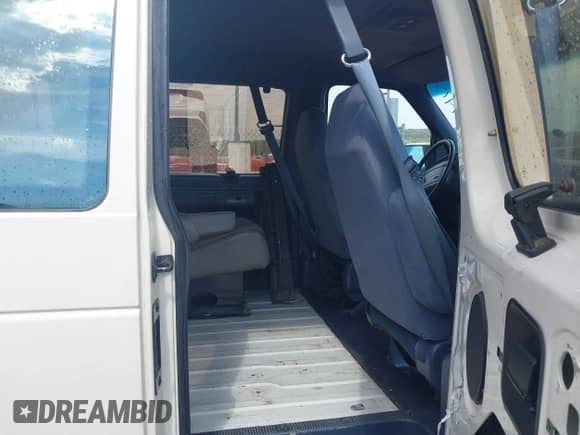 1992 Ford Econoline Cargo with VIN 1FMEE11Y7NHB60382, listed as a IAAI auction lot 43247475 with 105,914 mi miles and . Bid and sale history available at DreamBid. Image 8.