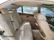 1998 BMW 7 Series 740iL with VIN WBAGJ8323WDM24309, listed as a Copart auction lot 65705964 with 206,422 mi miles and Clean title. Bid and sale history available at DreamBid. Image 10.