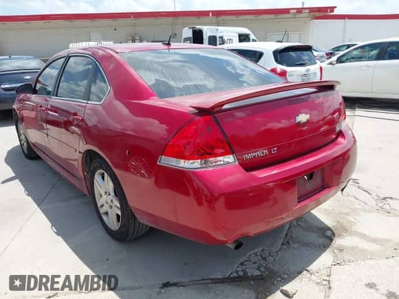 2013 Chevrolet Impala LT z VIN 2G1WB5E30D1204580, wystawiony jako IAAI lot #42575912 z przebiegiem 210 942 mil mil oraz . Historia ofert i sprzedaży dostępna na DreamBid. Obrazek 3.