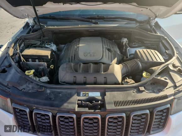 2018 Jeep Grand Cherokee Trailhawk z VIN 1C4RJFLTXJC256675, wystawiony jako Copart lot #80263015 z przebiegiem 130 103 mil mil oraz Szkoda całkowita • Salvage title. Historia ofert i sprzedaży dostępna na DreamBid. Obrazek 12.