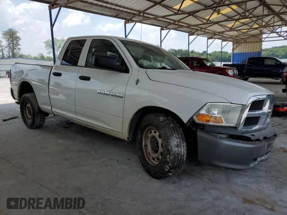 2011 Ram 1500 ST with VIN 1D7RB1GK6BS554462, listed as a Copart auction lot 62002135 with 333,972 mi miles and Salvage title. Bid and sale history available at DreamBid. Image 4.